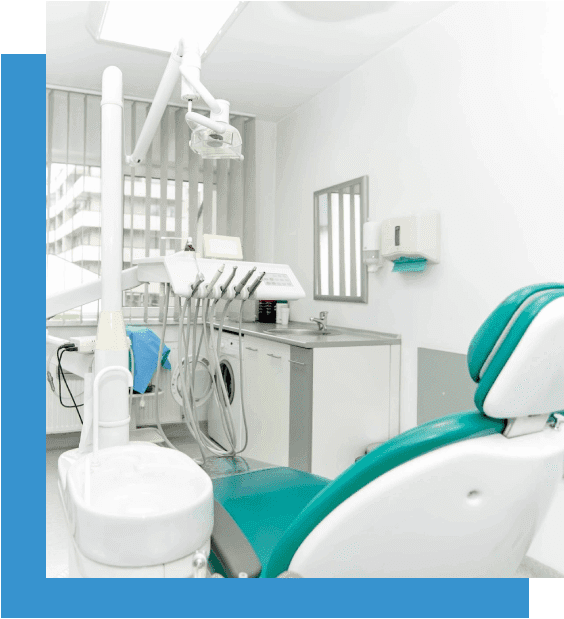 A dentist 's office with dental equipment and chairs.