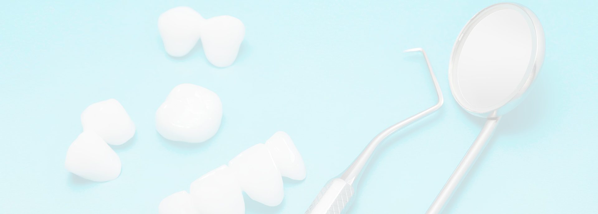 A tooth brush and some white teeth on a blue background